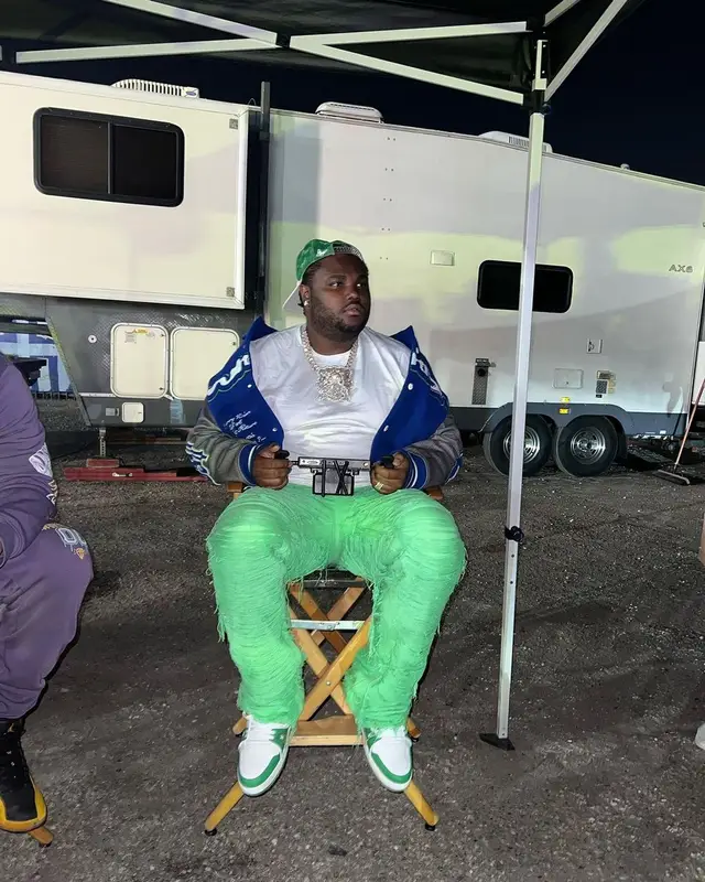 Tee Grizzley outfit in Louis Vuitton and Valabasas, 2023