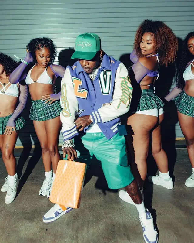 DaBaby outfit in Louis Vuitton, New Era, and Gallery Dept., 2023