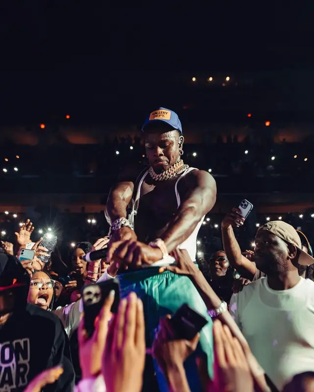 DaBaby outfit in Louis Vuitton, New Era, and Gallery Dept., 2023