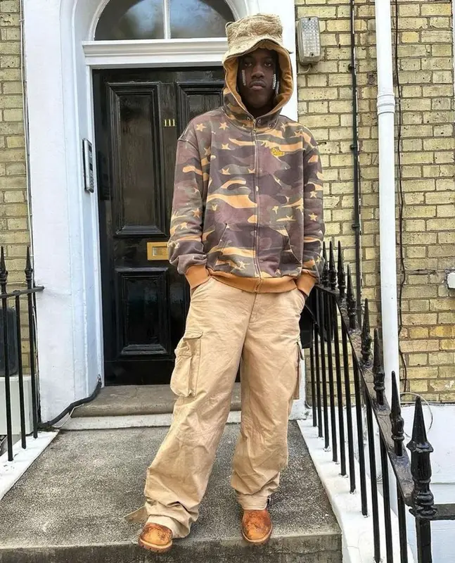 Lil Yachty outfit in Bottega Veneta, Timberland, and Kapital, 2023