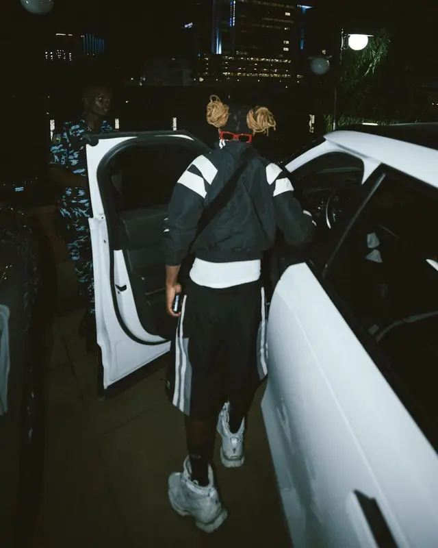 Asake outfit in Balenciaga, 2023