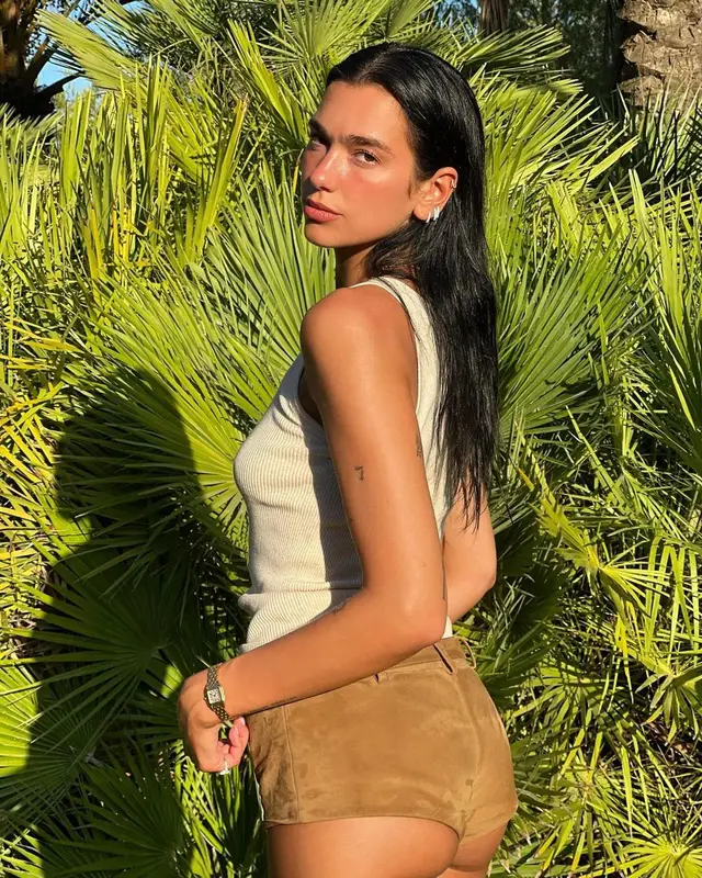 Dua Lipa outfit in Miu Miu and Cartier, 2023
