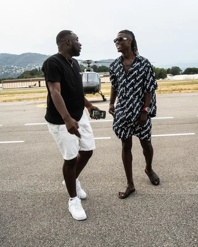 Eduardo Camavinga outfit in Balenciaga, Versace, and Louis Vuitton, 2023