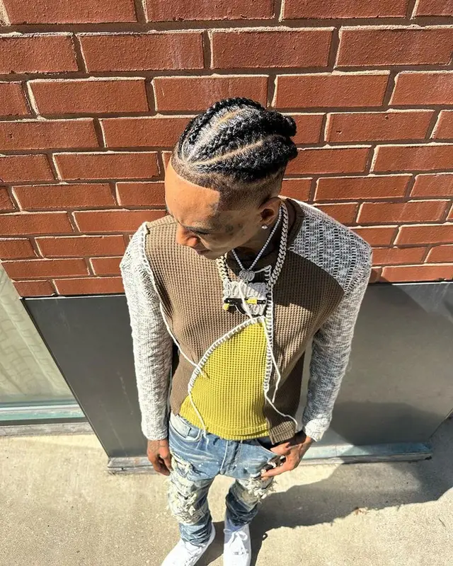 Soulja Boy outfit in Andersson Bell, Nike, and Burberry, 2023