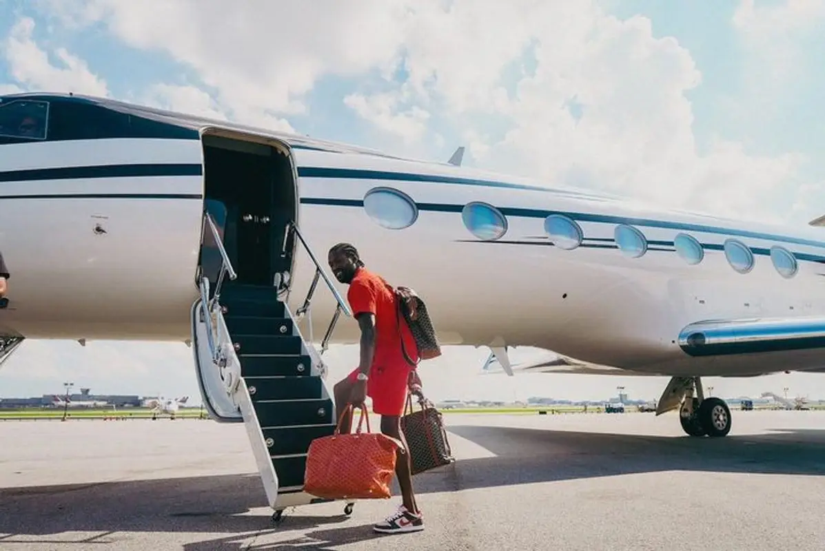 Meek Mill outfit in Givenchy, Nike, and Goyard, 2023