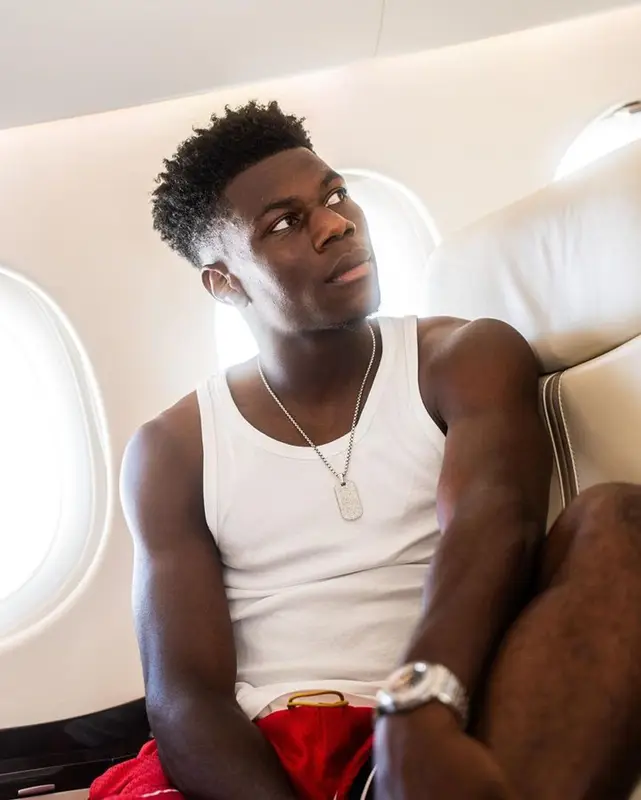 Aurelien Tchouameni outfit in Rhude, Louis Vuitton, and Burberry, 2023