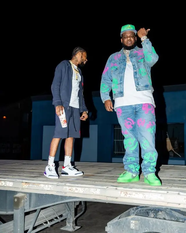 Maxo Kream outfit in Denim Tears, New Era, and Bstroy, 2023