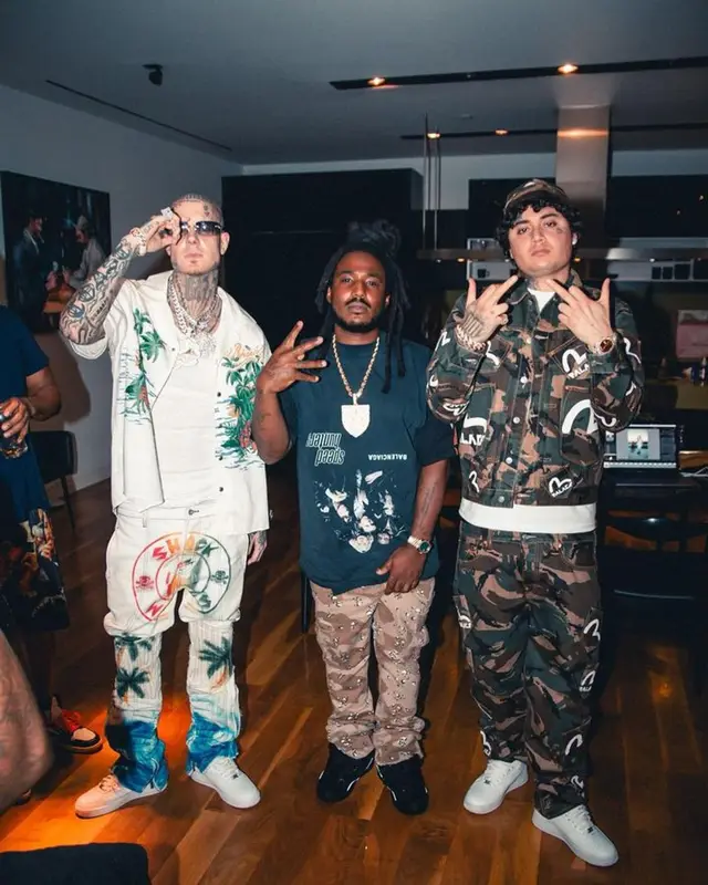OhGeesy outfit in Nike, Palace, and Evisu, 2023