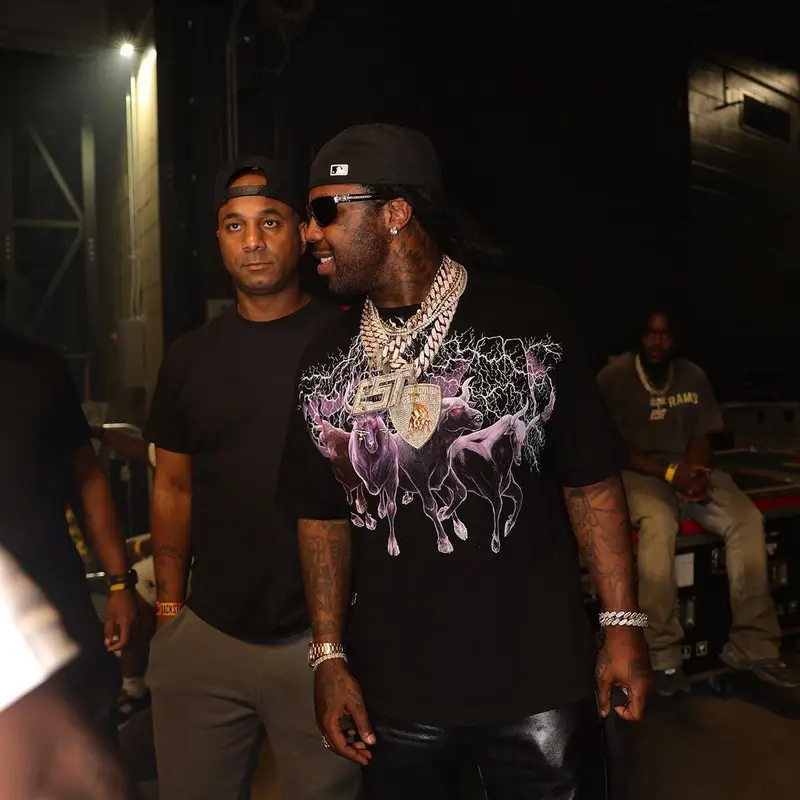EST Gee outfit in Chrome Hearts and New Era, 2023