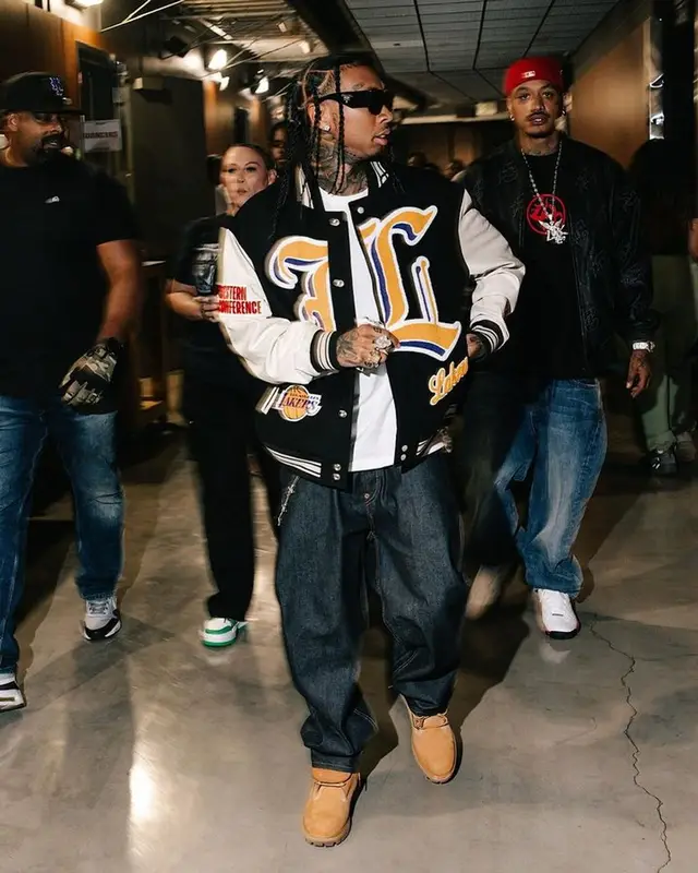 Tyga outfit in Jeff Hamilton, Palace, and Prada, 2023
