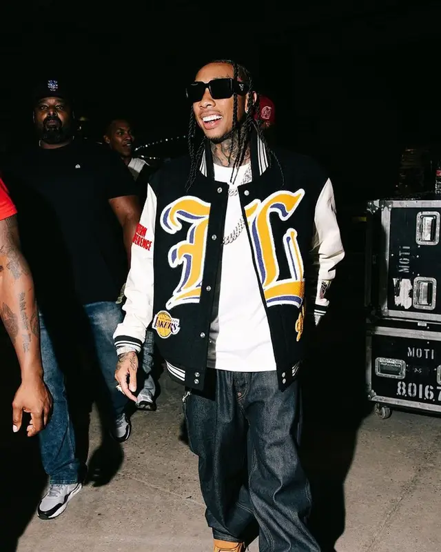 Tyga outfit in Jeff Hamilton, Palace, and Prada, 2023