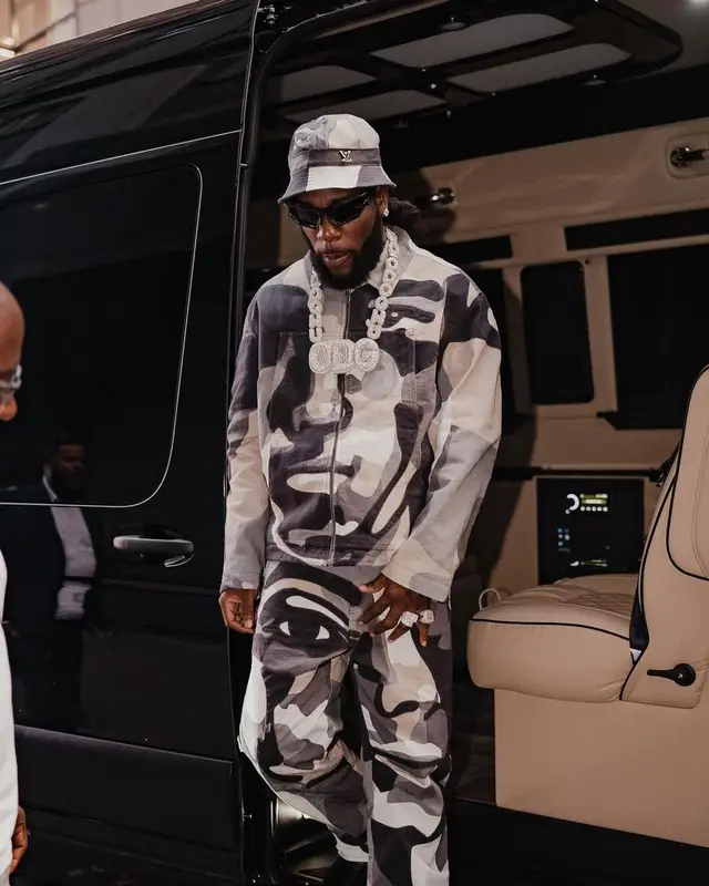 Burna Boy outfit in Givenchy and Louis Vuitton, 2023