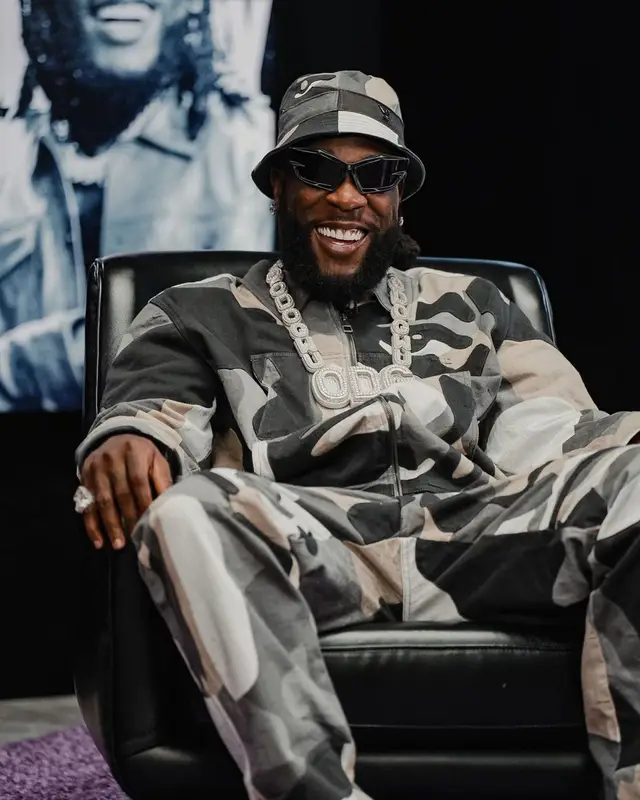 Burna Boy outfit in Givenchy and Louis Vuitton, 2023