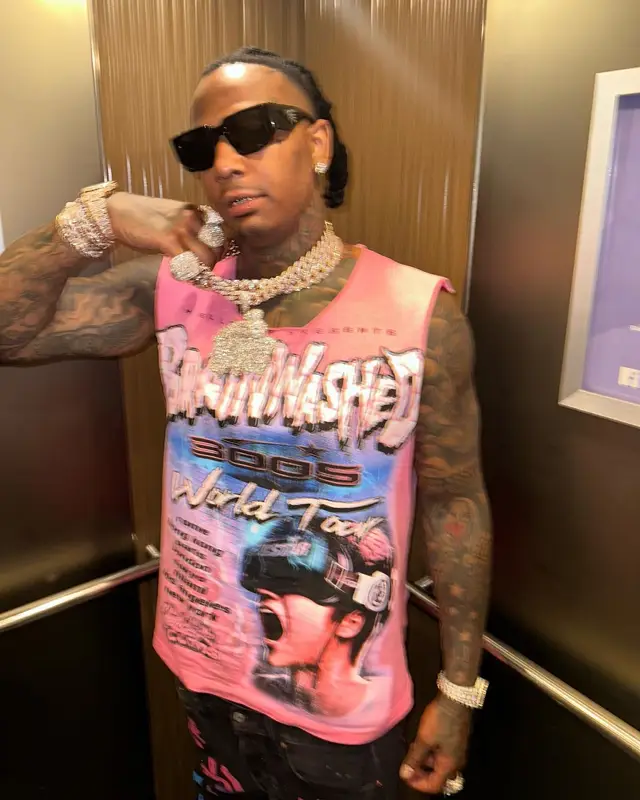 Moneybagg Yo outfit in Denim Tears, Prada, and Bstroy, 2023