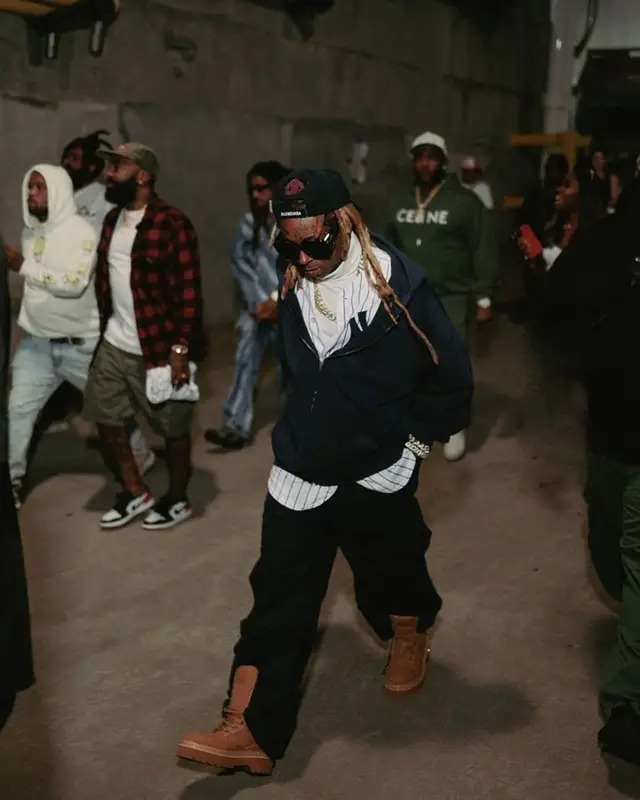 Lil Wayne outfit in Louis Vuitton, Burberry, and Balenciaga, 2023