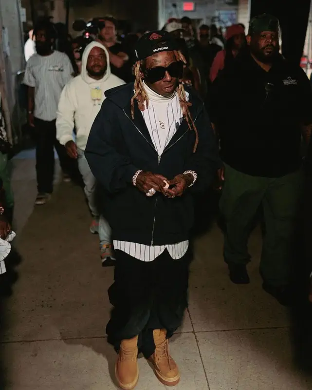 Lil Wayne outfit in Louis Vuitton, Burberry, and Balenciaga, 2023
