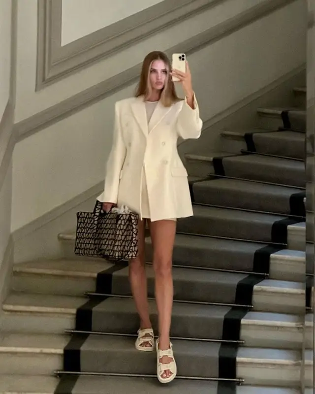 Rosie Huntington-Whiteley outfit in Wardrobe.NYC, Valentino, and Chanel, 2023