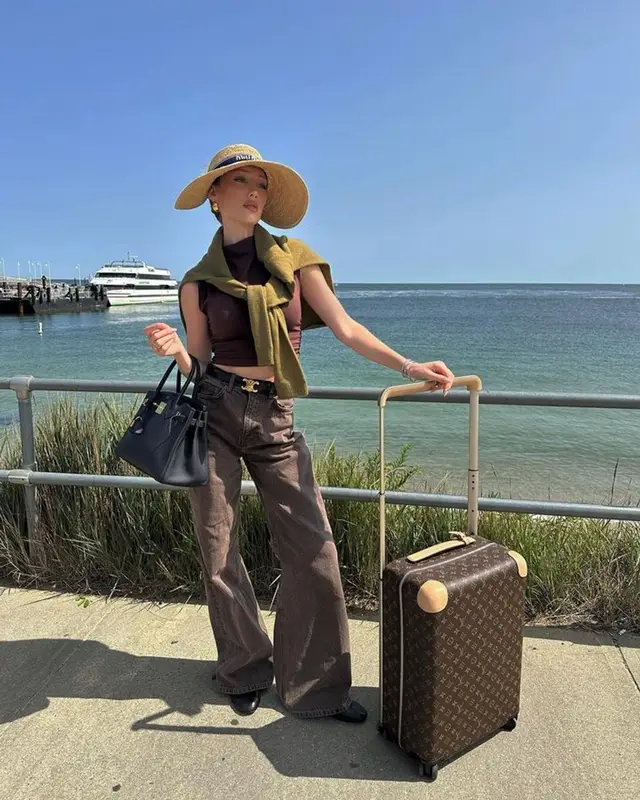 Meredith Duxbury outfit in Celine, Louis Vuitton, and Miu Miu, 2023