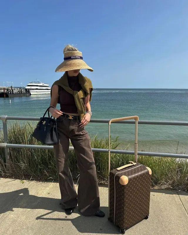 Meredith Duxbury outfit in Celine, Louis Vuitton, and Miu Miu, 2023