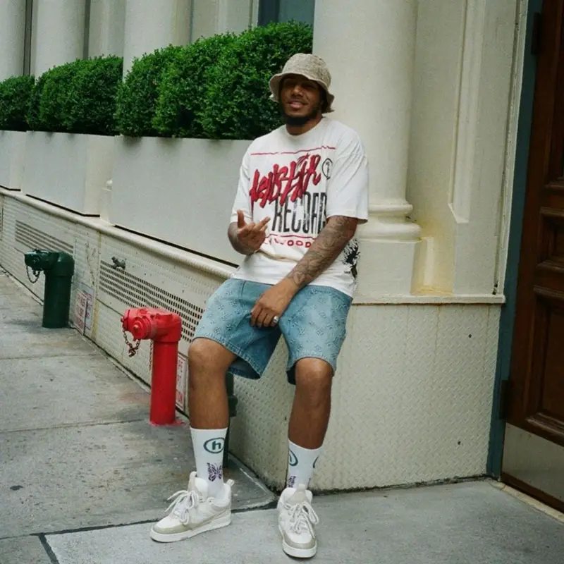 AJ Tracey outfit in Hellstar and Louis Vuitton, 2023