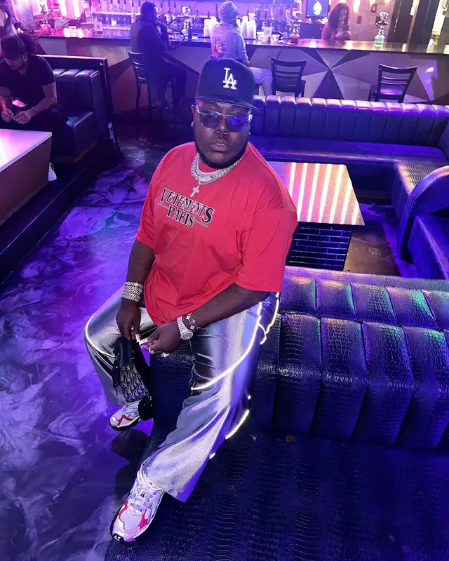 Saucy Santana outfit in Vetements, Dior, and New Era, 2023