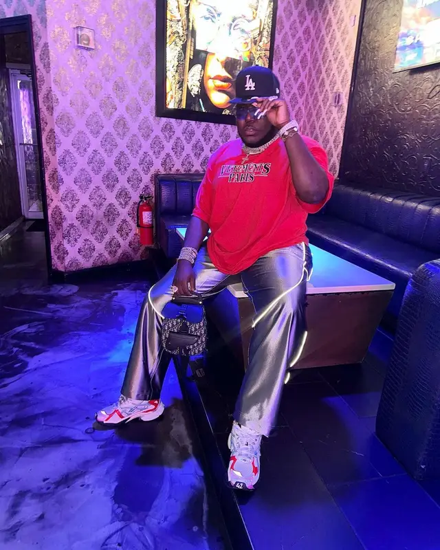 Saucy Santana outfit in Vetements, Dior, and New Era, 2023