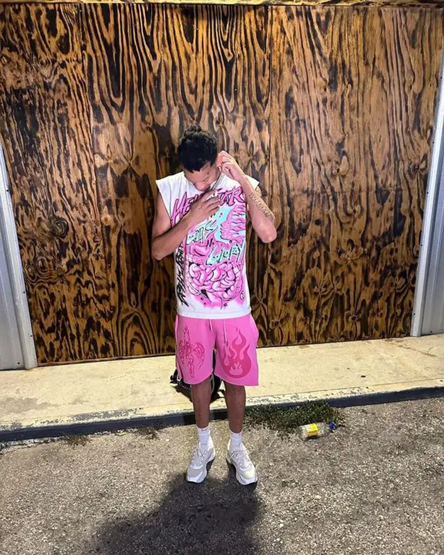 Stunna 4 Vegas outfit in Dior, Supreme, and Hanes, 2023