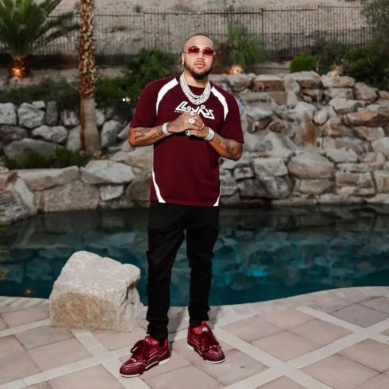 Mazi Vs outfit in Louis Vuitton and Amiri, 2023