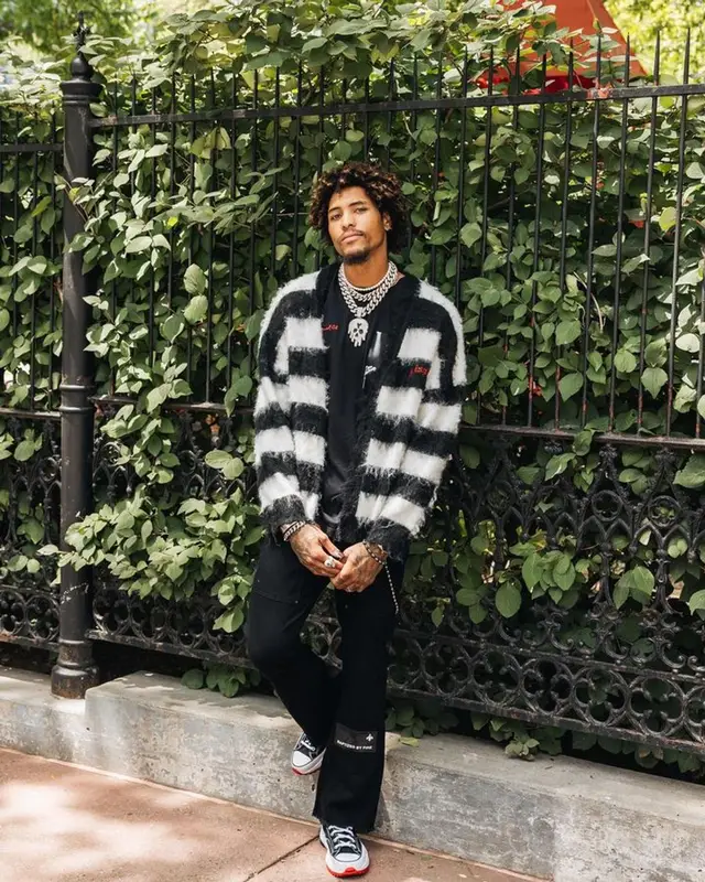 Kelly Oubre Jr outfit in Godspeed, DopeSoul, and Converse, 2023