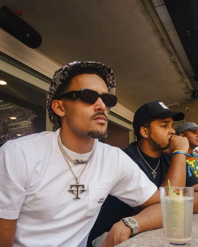 Trae Young outfit in Quiet Please, Prada, and Adidas, 2023