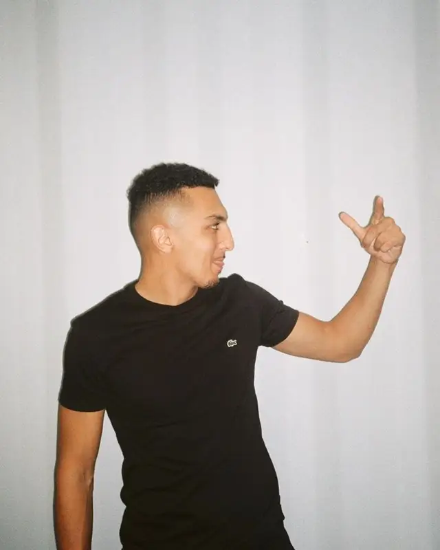 Morad outfit in Lacoste and Adidas, 2023
