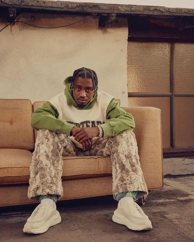 Lil Tjay outfit in Dior, ERL, and Denim Tears, 2023