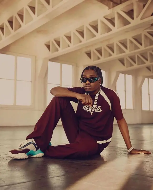 Lil Tjay outfit in Louis Vuitton, Camper, and Bottega Veneta, 2023
