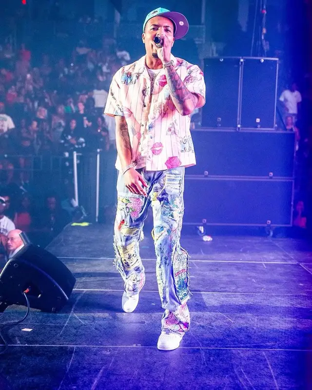 G Herbo outfit in Homme + Femme, Who Decides War, and New Era, 2023