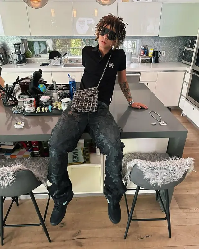 Iann Dior outfit in Dior, Rick Owens, and   Kaws, 2023