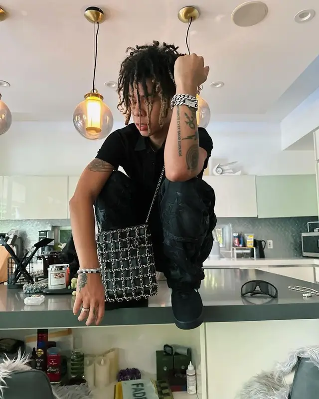 Iann Dior outfit in Dior, Rick Owens, and   Kaws, 2023