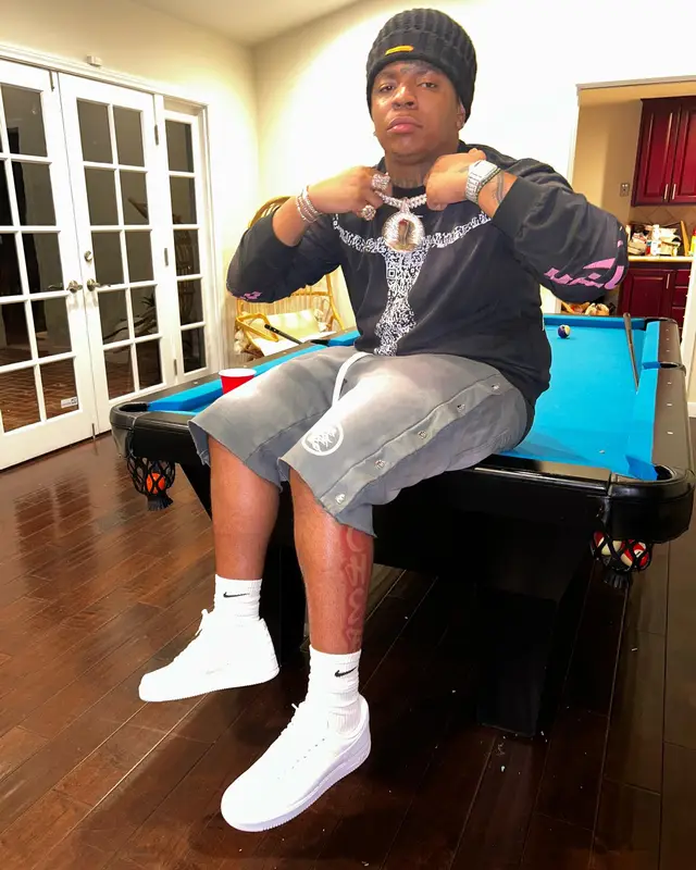 Lil Gotit outfit in Hellstar, Heron Preston, and Nike, 2023