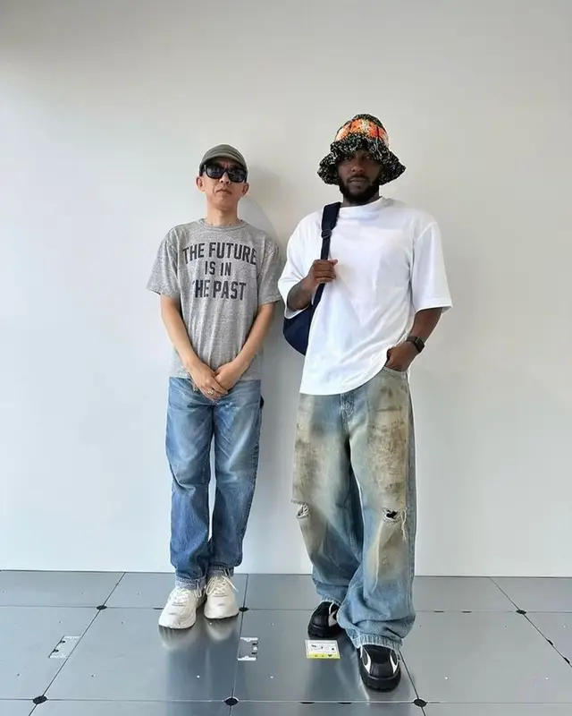 Kendrick Lamar outfit in Acne Studios, SEAO-KR, and Unlikely Fox, 2023