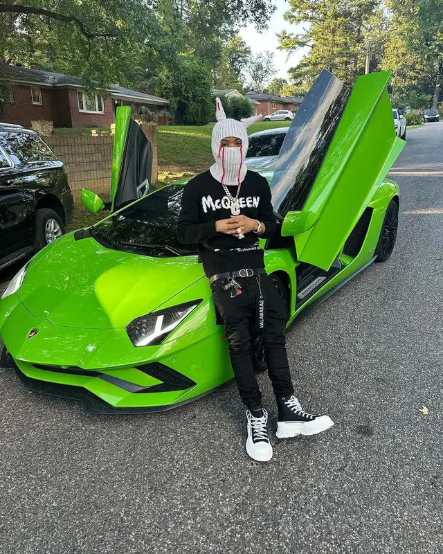 Lil Migo outfit in Alexander McQueen, Valabasas, and Dior, 2023