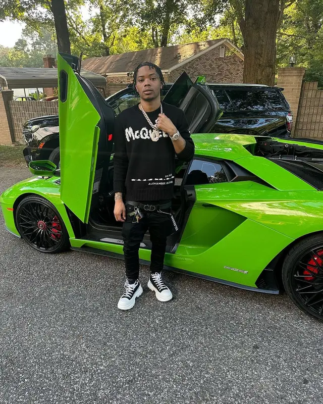 Lil Migo outfit in Alexander McQueen, Valabasas, and Dior, 2023