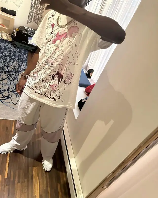 Lil Tjay outfit in Supreme and Prada, 2023