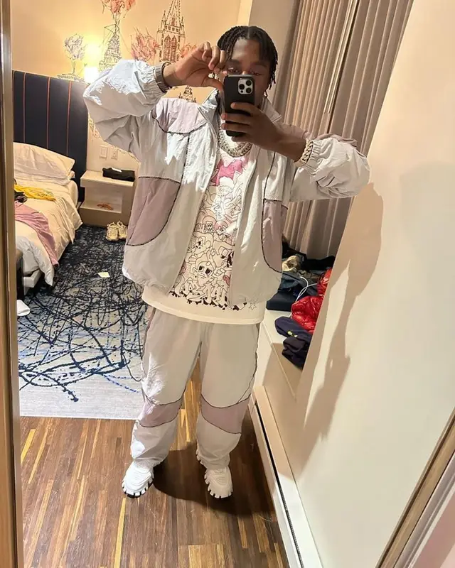 Lil Tjay outfit in Supreme and Prada, 2023