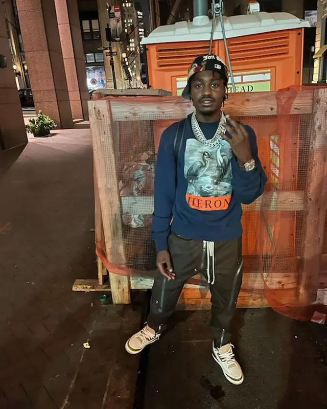 Lil Tjay outfit in Heron Preston, Jon Stan, and Chicago White Sox, 2023
