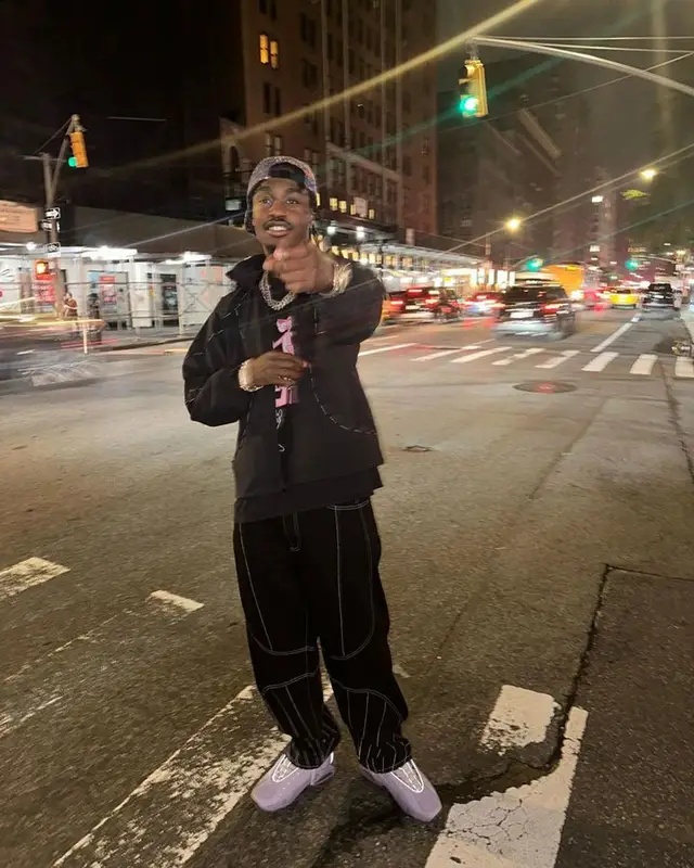 Lil Tjay outfit in Supreme, Nike, and Nocta, 2023