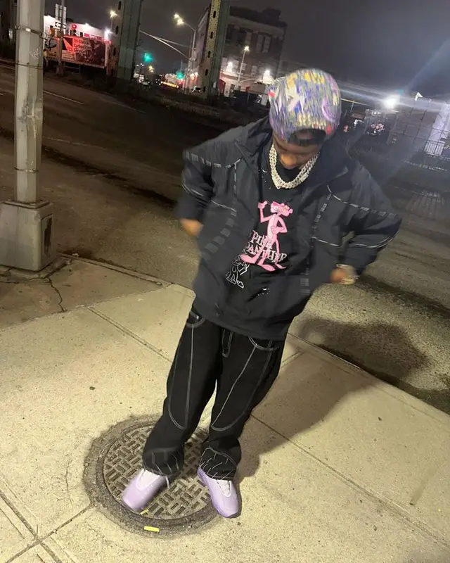 Lil Tjay outfit in Supreme, Nike, and Nocta, 2023