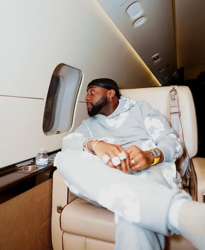 Davido outfit in Denim Tears and Bottega Veneta, 2023