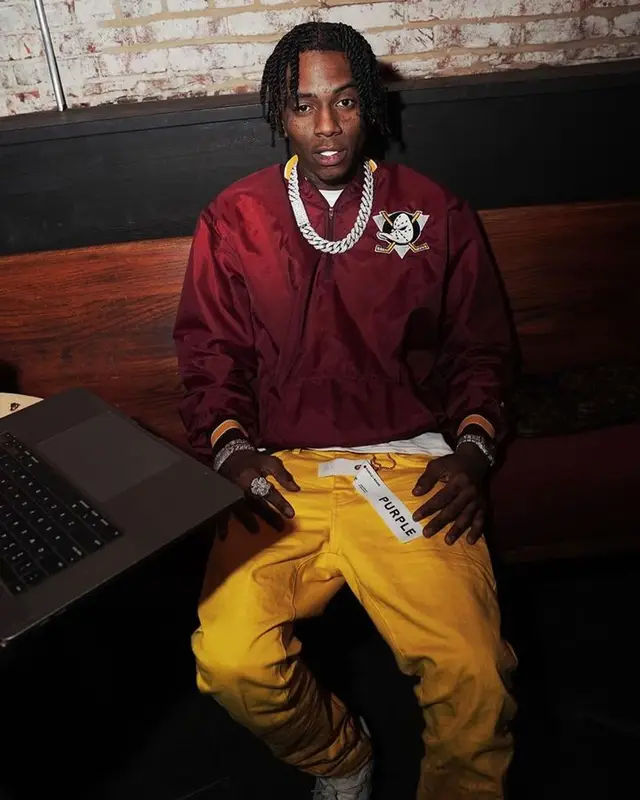 Soulja Boy outfit in Purple Brand, Nike, and Burberry, 2023