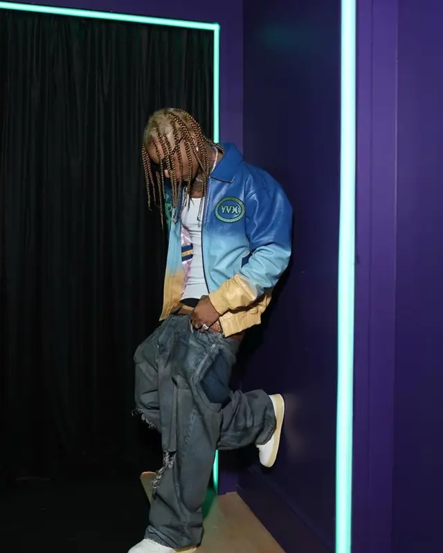 Ronny J outfit in Balenciaga, Nike, and Lanvin Buttoned, 2023
