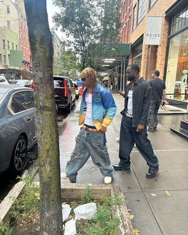 Ronny J outfit in Balenciaga, Nike, and Lanvin Buttoned, 2023
