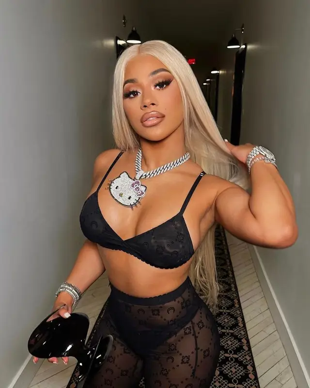 Hennessy Carolina outfit in Marine Serre, Balenciaga, and Saint Laurent, 2023